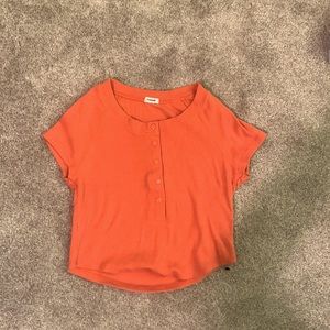 orange cropped baby tee with buttons